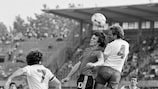 Belgium's Erwin Vandenbergh in an aerial duel with England's TURIN, ITALY - JUNE 12: Phil Thompson in Turin