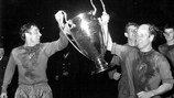 Bobby Charlton (right) and Shay Brennan lead Manchester United FC on their lap pf honour after winning the European Champion Clubs' Cup in 1968