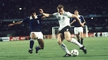 West Germany's Hans-Peter Briegel under pressure during the Greece game