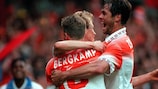Dennis Bergkamp is congratulated after scoring the second goal