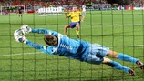 Netherlands goalkeeper Edwin van der Sar denies Olof Mellberg from the spot