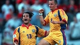 Romania goalscorers Dorinel Munteanu (right) and Cristian Chivu rejoice