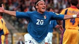 Italy's Francesco Totti takes the adulation after scoring the first goal against Romania