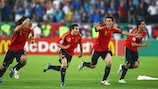 Spain players celebrate their shoot-out triumph in Vienna