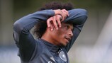 Leroy Sané takes a break during a Germany training session