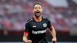Karim Bellarabi celebrates after scoring for Leverkusen