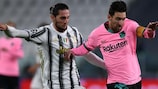 Juventus's Adrien Rabiot pursues Barcelona's Lionel Messi