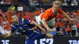 Netherlands's Dirk Kuyt scores against Ukrainian in a 2008 friendly