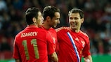 Russia's Alan Dzagoev, Roman Shishkin and Konstantin Zyryanov  celebrate against Denmark in 2012