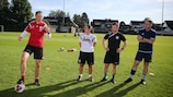 A coach educator in Germany leads a session for youth coaches 