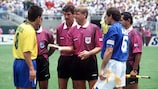 Referee Sándor Puhl flips a coin for Brazilian captain Dunga (left) as Italian captain Franco Baresi watches ahead of the 1994 FIFA World Cup final in Pasadena.