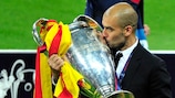 Josep Guardiola kisses the UEFA Champions League trophy after guiding Barcelona to victory in 2011