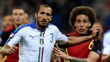 Italy's Giorgio Chiellini  and Belgium's Axel Witsel in action at EURO 2016