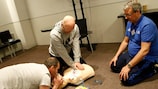 A practical session at a UEFA Football Doctor Education Programme workshop