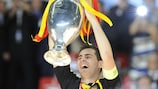 Spanish goalkeeper Iker Casillas celebrates as he holds the new EURO trophy aloft in 2008