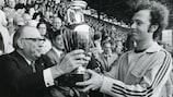 UEFA president Gustav Wiederkehr hands the original Henri Delaunay Cup to West Germany captain Franz Beckenbauer in 1972