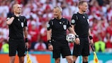 Bjorn Kuipers with assistant referees Sander van Roekel and Erwin Zeinstra at the group stage match between Denmark and Belgium in Copenhagen