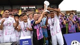  Players lift the trophy after the Hope Cup with BT Sport and UEFA Foundation