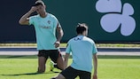 Portugal's national football team forward Cristiano Ronaldo (L) and team mates attend a training session at the Cidade do Futebol training camp in Oeiras, outside Lisbon, on August 31, 2021, ahead of their FIFA World Cup Qatar 2022 European qualifying round group A football match against Ireland. (Photo by PATRICIA DE MELO MOREIRA / AFP) (Photo by PATRICIA DE MELO MOREIRA/AFP via Getty Images)