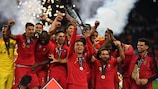  Cristiano Ronaldo and his Portugal team-mates celebrate with the UEFA Nations League trophy in 2019