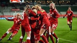 Denmark celebrate Signe Bruun getting her qualifying-leading 12th goal in the crucial win against Russia