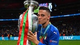 Italy and Sassuolo forward Giacomo Raspadori with the UEFA EURO 2020 trophy