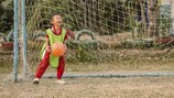 Unbounded joy as a young boy makes a save! 