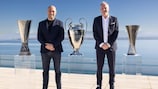 Socios.com CEO Alexandre Dreyfus (L) and UEFA marketing director Guy-Laurent Epstein (R) at the UEFA headquarters in Nyon.