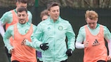 Celtic captain Callum McGregor leads his team during a training-ground run