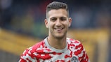 Diogo Dalot warms up before Manchester United's group stage match against Young Boys 