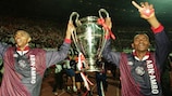 Nigerian pioneers Nwankwo Kanu and Finidi George with the UEFA Champions League trophy in 1995