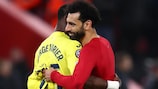 Serge Aurier and Mohamed Salah embrace after the first leg