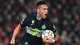 Lautaro Martínez celebrates his goal at Anfield in the round of 16 second leg