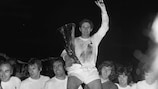  Tottenham Hotspur captain Alan Mullery holds the UEFA Cup trophy after his team became its first winners in 1972