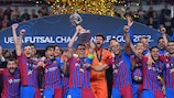 Sergio Lozano lifts the trophy having been part of all four Barça wins
