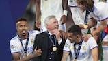 Carlo Ancelotti on the podium with his victorious Real Madrid players