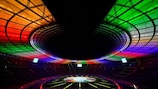 The Olympic stadium is lit up with the colors of the new UEFA Euro 2024 football championship logo presented at the Olympic stadium in Berlin, on October 5, 2021. (Photo by John MACDOUGALL / AFP) (Photo by JOHN MACDOUGALL/AFP via Getty Images)