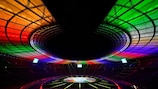 The Olympic stadium is lit up with the colors of the new UEFA Euro 2024 football championship logo presented at the Olympic stadium in Berlin, on October 5, 2021. (Photo by John MACDOUGALL / AFP) (Photo by JOHN MACDOUGALL/AFP via Getty Images)