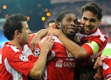 Olympiacos players celebrate a goal during the 2010/11 campaign