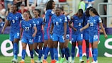 France celebrate racking their fifth goal against Italy
