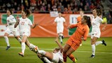 Lieke Martens (right) scores the Netherlands' second goal against Switzerland in the 2019 Women's World Cup play-off first leg
