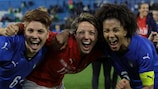 Sara Gama (right), Valentina Giacinti (centre) and Manuela Giugliano celebrate Italy's win against Belgium in 2018