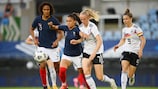 France's Sakina Karchaoui (left) contests possession with Lea Schüller of Germany during the teams' friendly in June 2021