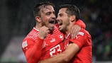 Remo Freuler and Xherdan Shaqiri celebrate a Switzerland goal against Czechia