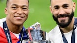 France's Kylian Mbappé and Karim Benzema with the UEFA Nations League trophy in 2021