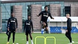 Chelsea's Raheem Sterling takes a leap in training on Tuesday