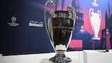 The UEFA Champions League trophy on display in Nyon ahead of the draw