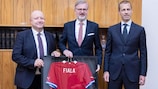 FAČR President Petr Fousek (l), Czech Prime Minister Petr Fiala (centre) and UEFA President, Aleksander Ceferin (r)