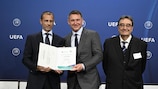 Källström (centre) with UEFA president Aleksander Čeferin (left) and Jean-Jacques Gouguet, president of the UEFA MIP Scientific Committee 
