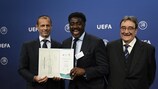 Touré (centre) with UEFA president Aleksander Čeferin (left) and Jean-Jacques Gouguet, president of the UEFA MIP Scientific Committee 